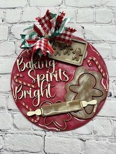 a sign on the side of a brick wall that says baking spirit's bright