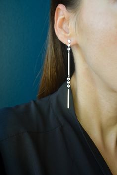 "Extra Long dangle Sterling silver earrings - statement yet minimal geometric earrings. These silver earrings are delicate and playful, they are lightweight, long and skinny and perfect for sensitive ears. They showcase minimal geometric shapes that drop from tiny round flat studs, they move and reflect light that they catch. These elegant, simple earrings will make a beautiful gift.  ► Length (from tip to tip) - 3.86\" (9.8 cm)  ► Stud - 4 mm ●  925 Sterling Silver ●  Made to Order just for you Cheap Long Drop Linear Earrings, Luxury Linear Drop Earrings For Formal Occasions, Luxury Sterling Silver Linear Drop Earrings, Rectangle Earrings, Long Drop Earrings, Statement Drop Earrings, Earrings Geometric, Long Dangle Earrings, Funky Jewelry