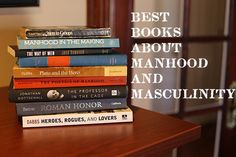 a stack of books sitting on top of a wooden table