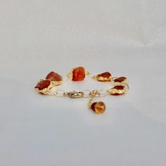 Rich in autumn spirit, these amber shades of carnelian organic stones come together in a warm bracelet.  Gold filled clasp and extender chain giving ultimate sizing options.  (7"-8") Comes with matching earrings. Autumn Spirit, Bracelet Gold, Gemstone Bracelet, Matching Earrings, Jewelry Sets, Natural Gemstones, Gold Filled, Halloween Shopping, Amber