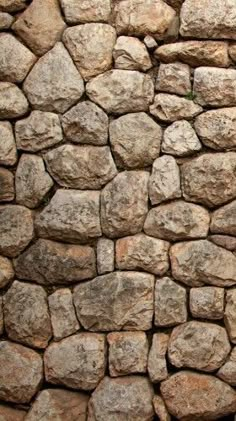 an old stone wall made out of rocks