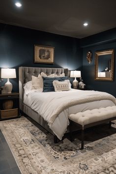 a large bed sitting on top of a rug in a bedroom