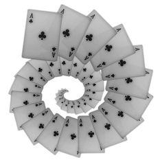 four playing cards are arranged in the shape of a spiral