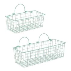 two white wire baskets sitting next to each other