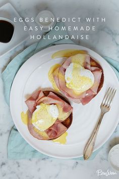 eggs benedict with easy homemade hollandaise on a white plate next to a cup of coffee