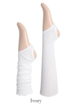 Introducing the MOMO Leg Warmer - a versatile and stylish accessory that's ready to add a touch of charm to your outfit. Crafted from a soft, ribbed blend of cotton and modal, these leg warmers offer both comfort and style. The ruffle finishing hem with vertical punching lines adds a delightful texture and detail.Designed to be wearable all year round. Wear them knee-high with a leotard or leggings for a classic look. For a trendy twist, try the ruched style with loose socks paired with shorts o Comfortable Cotton Knee-high Socks For Spring, Cozy Fitted Ribbed Knee-high Socks, Comfortable Stretch Knee-high Socks For Spring, Cozy Ribbed Knee-high Socks, Cozy Ribbed Fitted Knee-high Socks, Solid Ribbed Stretch Leg Warmers, Solid Stretch Ribbed Leg Warmers, Cotton Knee-high Socks For Spring, Fitted Ribbed Leg Warmers For Spring