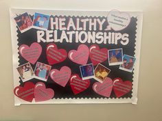 a bulletin board with hearts on it that says healthy relationships and pictures of people