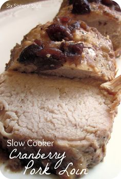 slow cooker cranberry pork loin on a white plate with text overlay