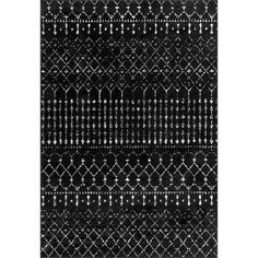 a black and white rug with an intricate design