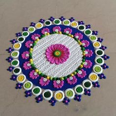 a colorful rug with flowers and circles on it