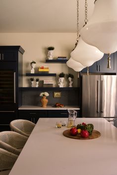 the kitchen is clean and ready to be used as a dining room or family room