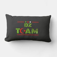 a black pillow with the word dz team printed on it and stars in green