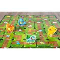 a game board with several different animal figures on it and one is missing the top