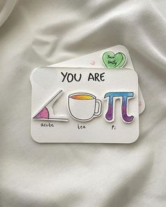 there is a sticker with the words you are pi and a coffee cup on it