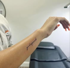 a woman's arm with a tattoo that reads, love is forever on it