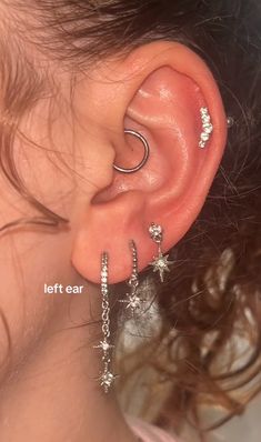 an ear with three stars attached to it