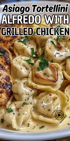 a white plate topped with pasta and chicken