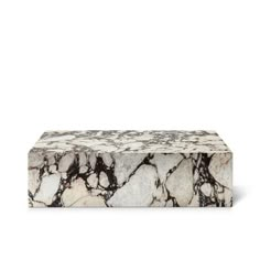 a white and black marble box on a white background