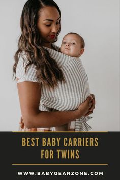 a woman holding a baby in her arms with the words best baby carriers for twins