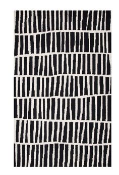 an abstract black and white pattern with vertical lines on the bottom half of the image