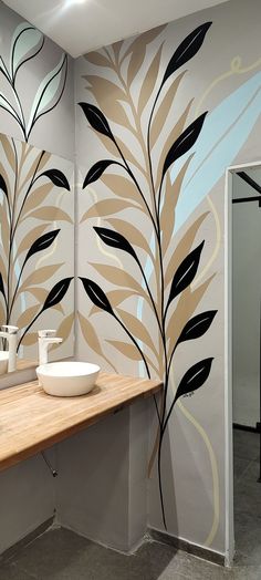 the bathroom is decorated with modern wallpapers