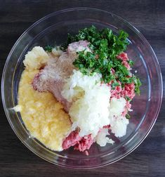 the food is prepared and ready to be put in the bowl on the wooden table