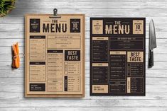 two menus on a wooden table with utensils and a knife next to them