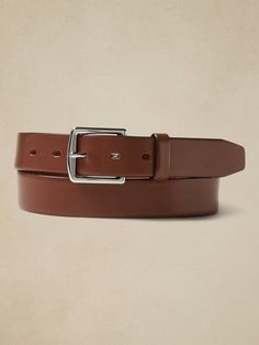 A versatile dress belt, made in luxurious, smooth and sturdy Italian leather.  Approximately 1. 25" wide. Classic Formal Belt Buckles, Timeless Leather Belt For Formal Occasions, Classic Formal Belts And Suspenders With Removable Belt, Leather Belt With Removable Buckle For Semi-formal Occasions, Elegant Leather Belt With Smooth Grain, Classic Brown Belt Buckles For Work, Classic Bridle Leather Belt Buckles For Workwear, Modern Leather Belt For Semi-formal Occasions, Timeless Brown Belt For Formal Occasions