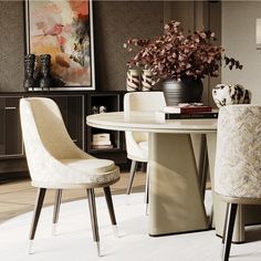 a dining room table with two chairs around it