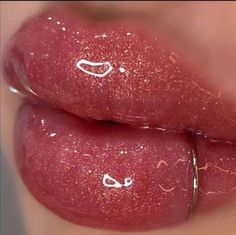 two lips with white writing on them