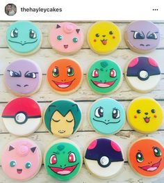 pokemon cupcakes are arranged in rows on a wooden table with the caption that says, they have eyes