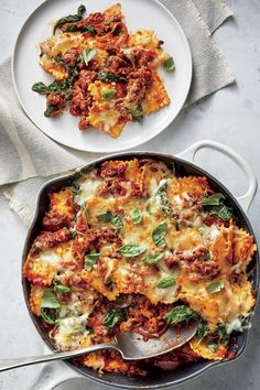 two plates with lasagna casserole and one plate with meat on it