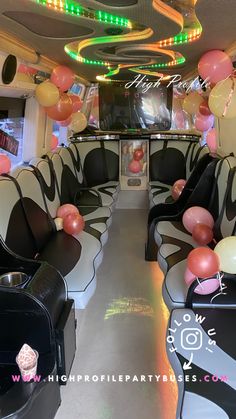 the inside of a party bus decorated with balloons and streamers for an animal theme