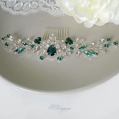 This is an elegant and romantic ''Sigrid''  green crystal hair comb from our wedding accessories collection. The silver hair comb is made with emerald and clear rhinestones. An emerald hair comb will be a perfect addition to many festive hairstyles for the green wedding. Each branch is flexible and can be moved to your liking. This green hair jewelry is the perfect accessory for brides, bridesmaids, Proms, and any special occasion.  Available in silver and gold, measures approx. 7,6" wide by 1,3 Emerald Green Hair, Emerald Hair, Festive Hair, Blue Wedding Hair, Silver Hair Comb, Crystal Hair Vine, Rhinestone Hair Comb, Royal Blue Wedding, Floral Hair Combs