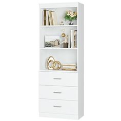 a white bookcase with two drawers and some books