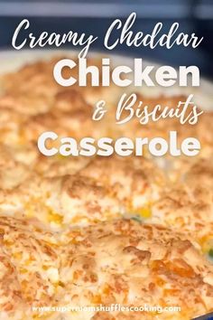 creamy cheesy chicken and biscuits casserole in a blue dish with text overlay