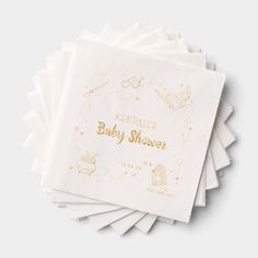 baby shower napkins with gold foil on them