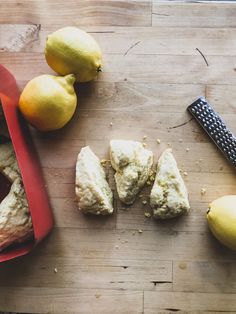 some lemons and other food on a cutting board