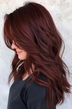 Goodbye, boring hair - hello, showstopping red! Check out our blog post that is sharing over 30 of the prettiest red hair colors that are just wow. You'll see subtle shades like the dark red brown hair color here and dramatic tones like ruby, redwood, and more. Click through to the blog and save this pin so you can view all the stunning shades later! Fall Hair Colors Burnett, Spiced Cinnamon Hair Color, Dimensional Burgundy Red Hair, Cowboy Copper Dark Hair, Dark Brunette To Red Hair, Auburn All Over Hair Color, Redwood Hair Color, Red Hair Color For Brown Eyes, Hair Dye For Medium Skin Tone