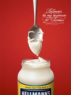 a spoon full of mayonnaise being lifted from a jar with the word hellman's mayonnaise on it