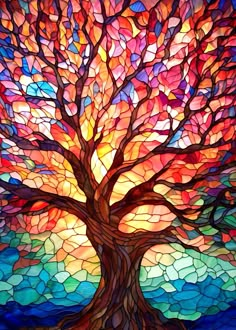 a stained glass tree with colorful leaves on it