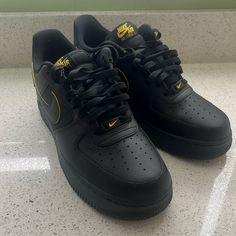 Talk Bout Prices Nike Air Force 1 Black With Branded Insole, Black And Gold Air Force 1, Airforce 1 Black Swoosh, Black Low-top Nike Air Force 1, Black Nike Air Force 1 Fade-resistant For Streetwear, Shoes Nike Air Force, Af1 Shoes, Nike Gold, Nike Air Force 1 07