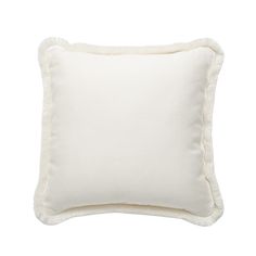 a white pillow with ruffle trim on the front and back of it, against a white background