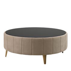 a round coffee table with wooden legs and a black top on an isolated white background