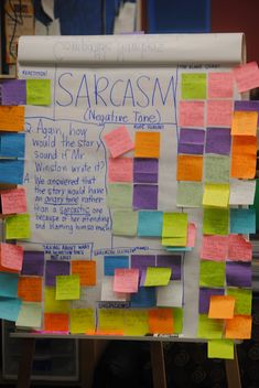 a bulletin board covered in sticky notes and post - it notes that read sarcasm