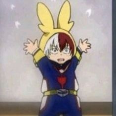 an anime character with his arms up in the air