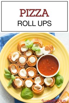 pizza roll ups on a yellow plate with sauce