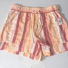 Brand New With Tags Gap Women’s Light Pink Stripes Pull On Lounge Shorts Size Small. These Shorts Give Beachy Vacation Vibes! Could Be Used Over A Swimsuit Or For Everyday Wear! Bundle And Save 10%! Smoke Free Home. Cart Multiple Items And I Will Send An Offer! This Is A Final Sale, I Do My Best To Disclose Any Flaws Or Damage But Please Review All Photos Before Purchasing And Read The Description. Please Do Not Hesitate To Message Me Or Comment With Any Additional Questions. Thank You And Happy Gap Pink Cotton Bottoms, Pink Summer Pajama Shorts With Elastic Waistband, Pink Elastic Waistband Pajama Shorts For Summer, Gap Spring Short Bottoms, Gap Bottoms With Built-in Shorts For Summer, Gap Spring Shorts, Gap Cotton Shorts For Spring, Gap Cotton Pajama Shorts Casual Style, Gap Cotton Casual Pajama Shorts