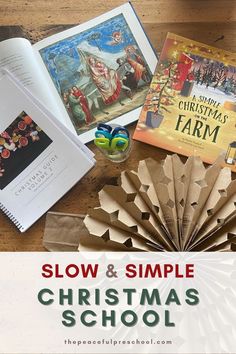 a table topped with books and other items to make a christmas book cover for the slow & simple christmas school