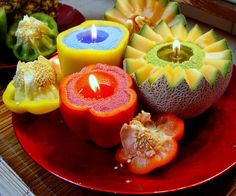 a red plate topped with different types of fruit